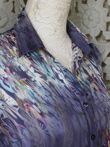 Purple Blouse with White Floral Pattern